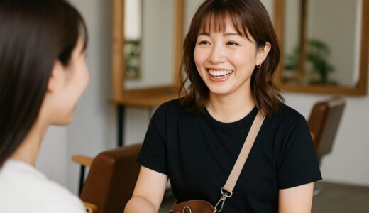 美容室で30代の日本人女性美容師が笑顔でお客様に対応している様子